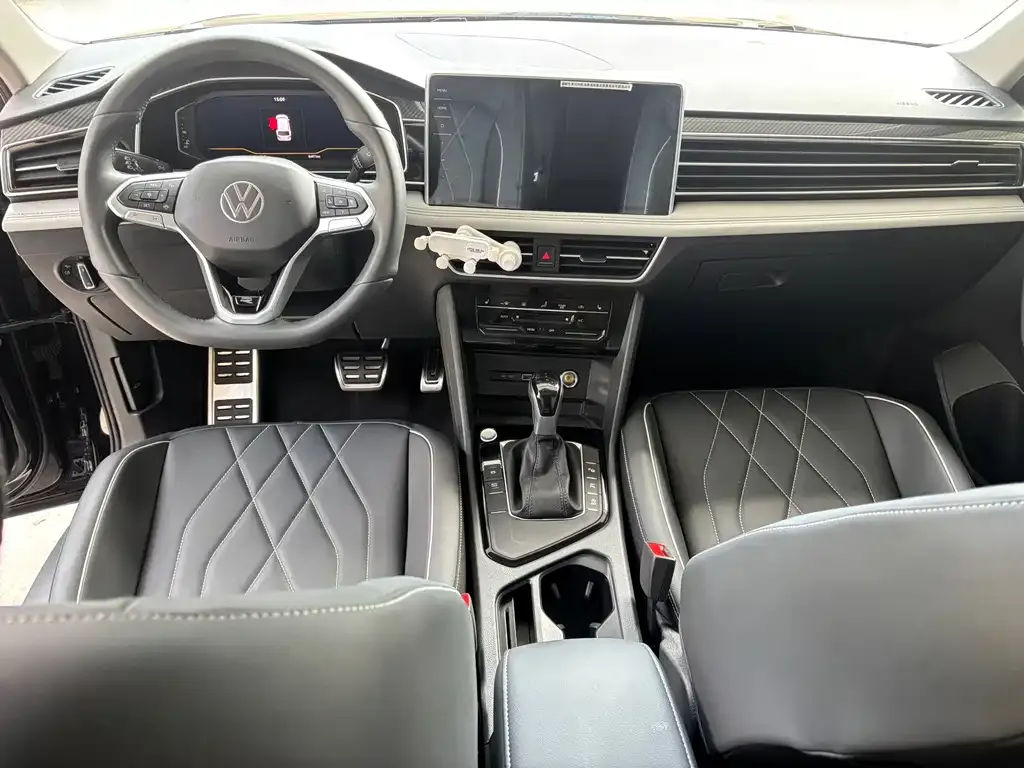 Volkswagen Tiguan L — фото 9