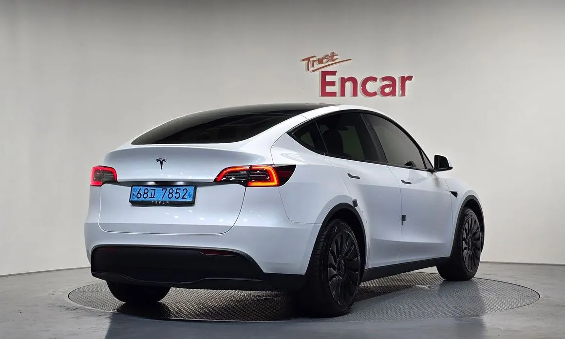 Tesla Model Y — фото 7