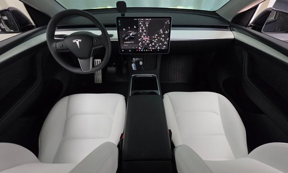 Tesla Model Y — фото 9