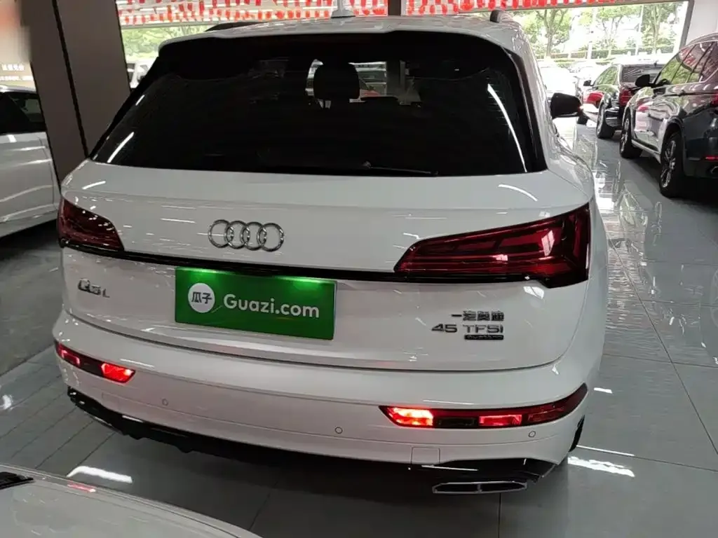 Audi Q5L — фото 10