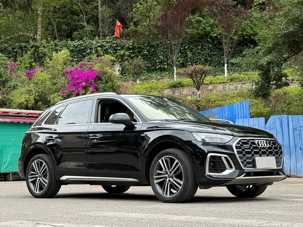 Audi Q5L — фото 10