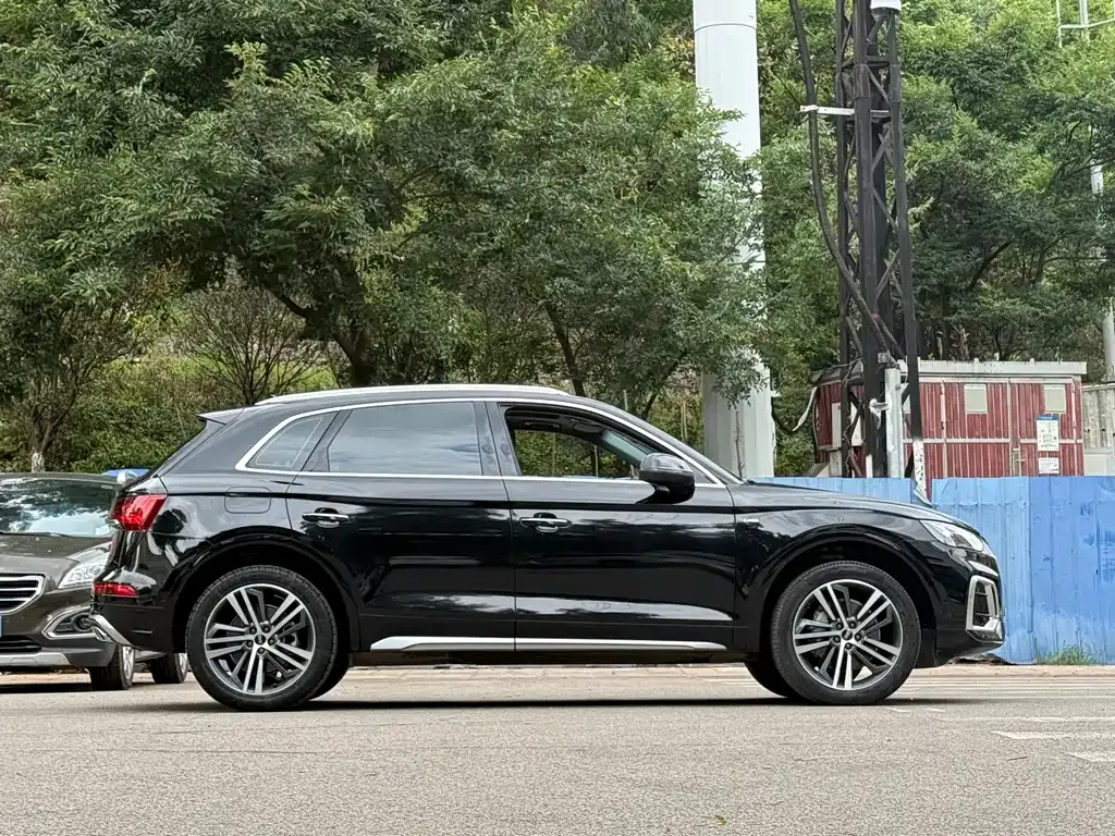 Audi Q5L — фото 9