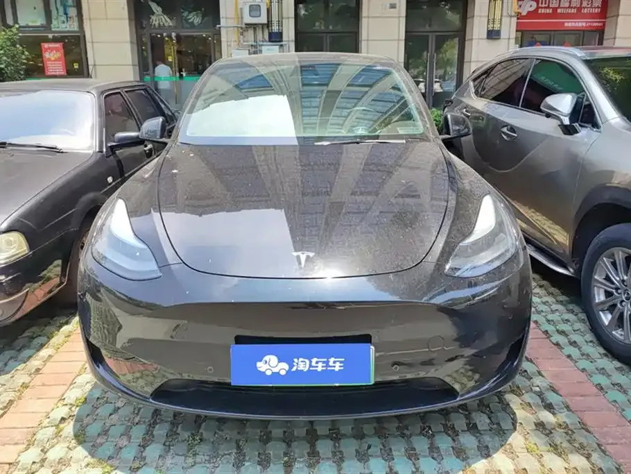 Tesla Model Y — фото 7