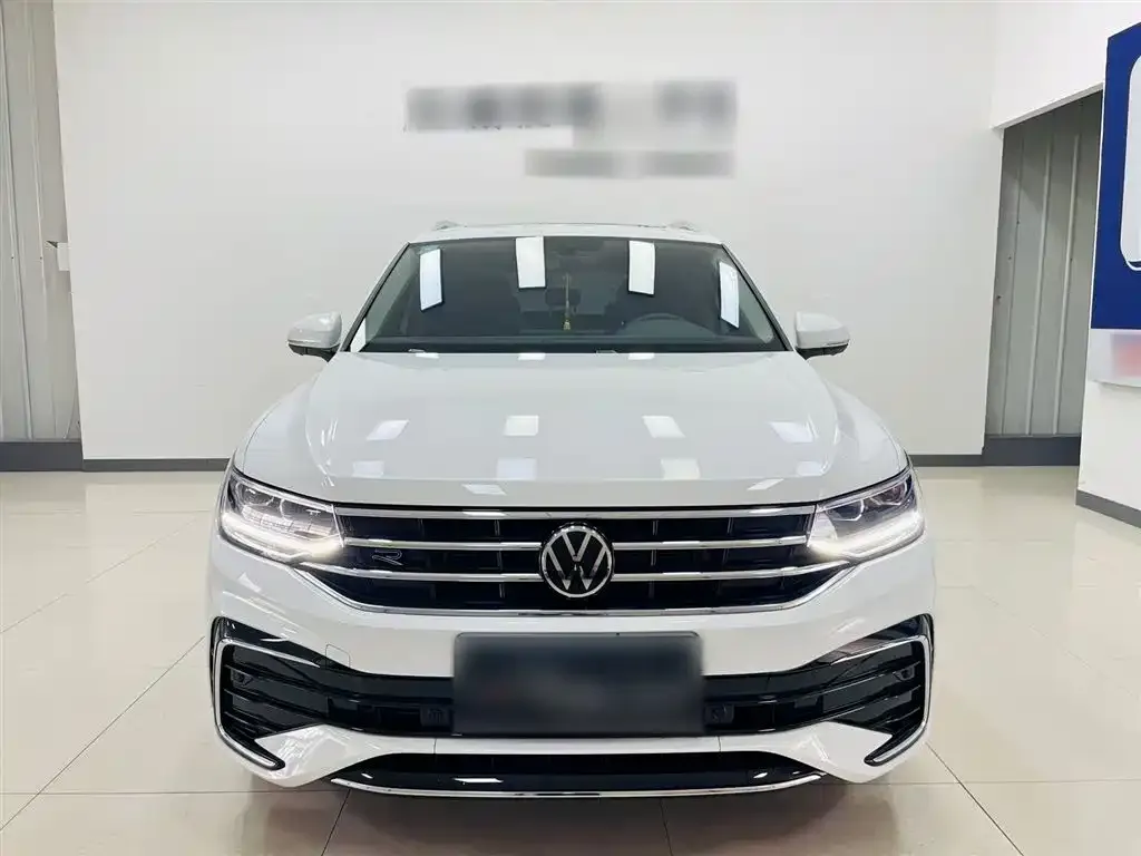 Volkswagen Tiguan L — фото 6