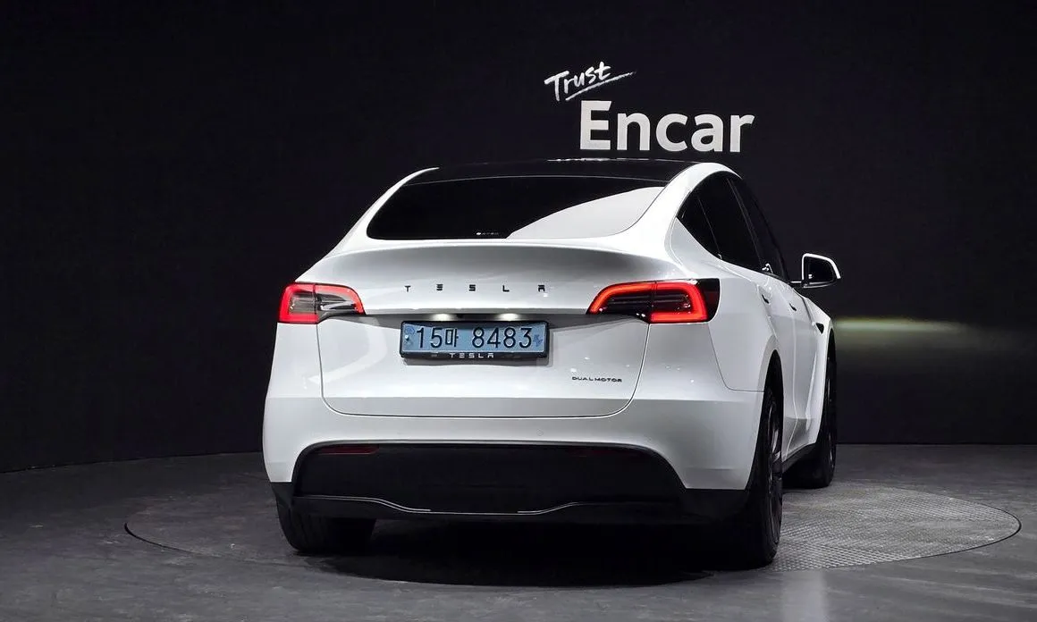 Tesla Model Y — фото 9