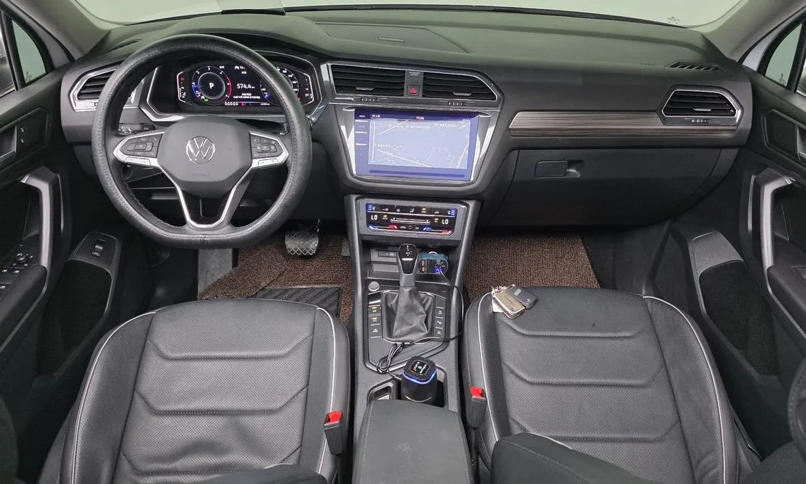 Volkswagen Tiguan — фото 10