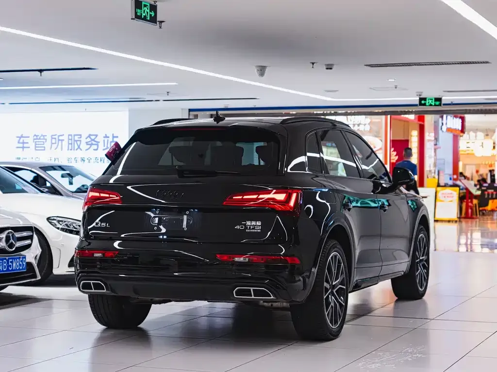 Audi Q5L — фото 7