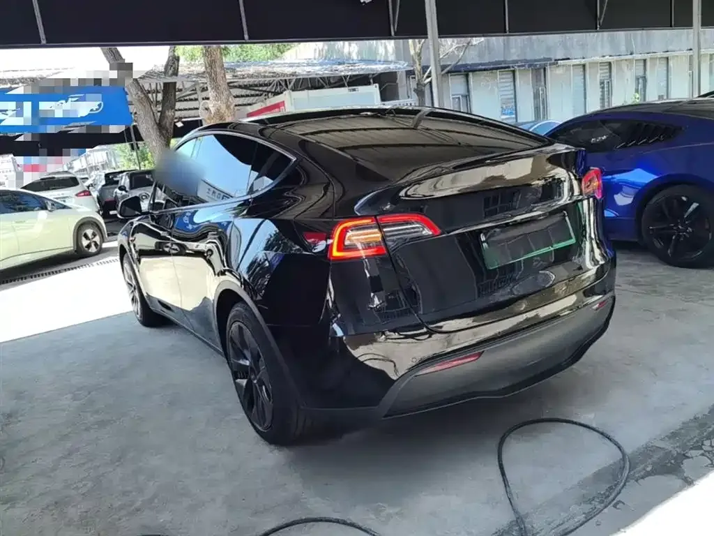 Tesla Model Y — фото 9