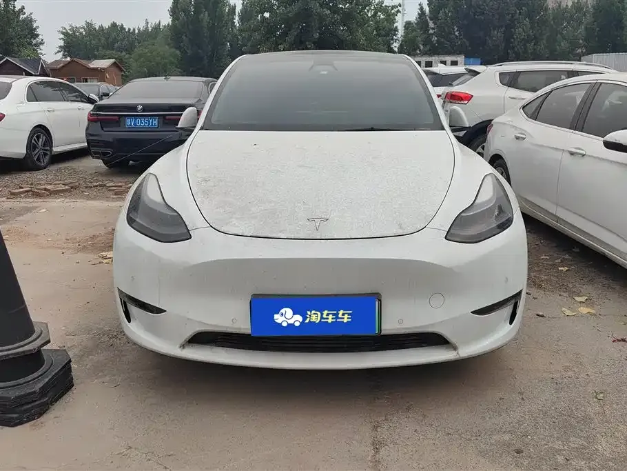 Tesla Model Y — фото 10