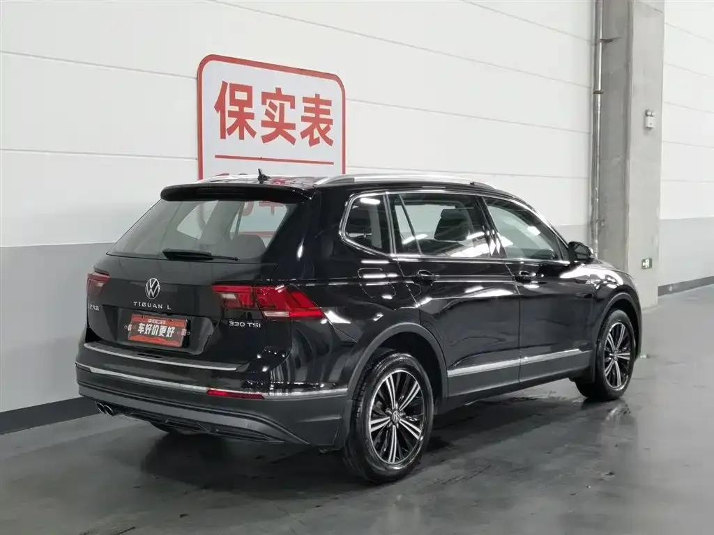Volkswagen Tiguan L — фото 5