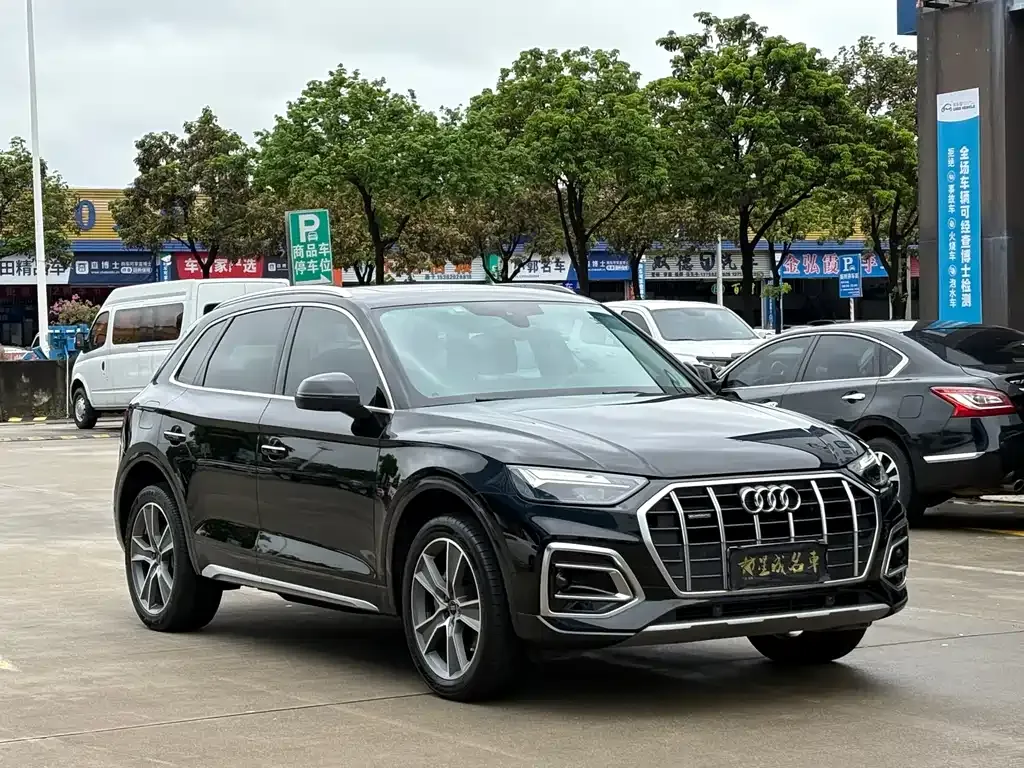 Audi Q5L — фото 10