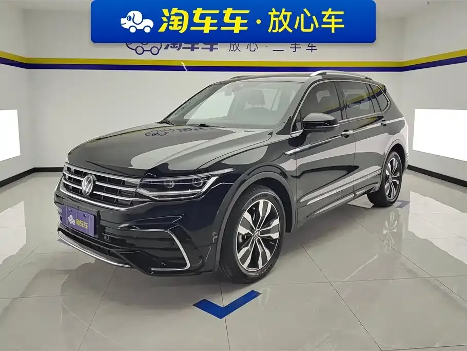 Volkswagen Tiguan L — фото 1