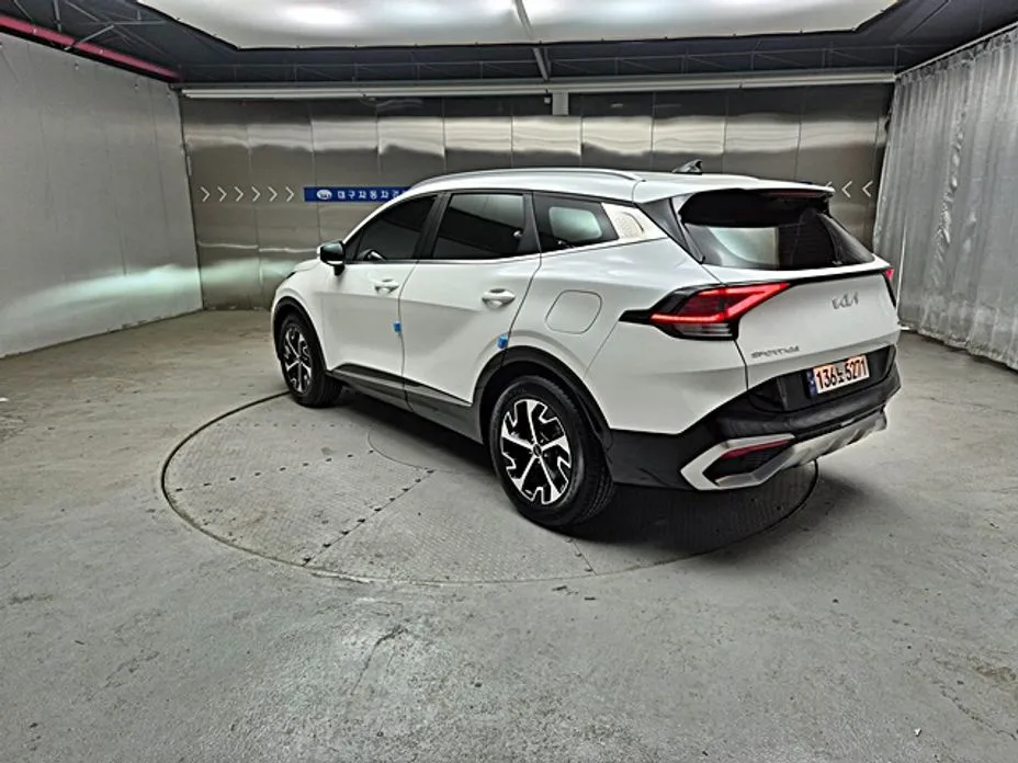 Kia Sportage — фото 8