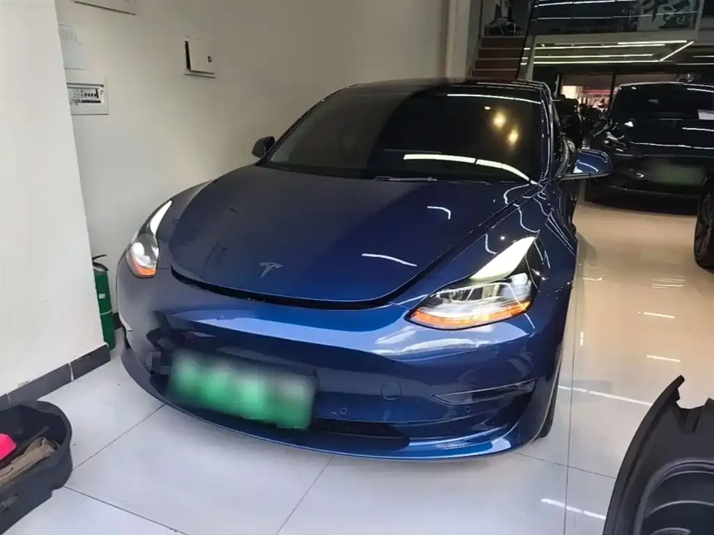 Tesla Model 3 — фото 5