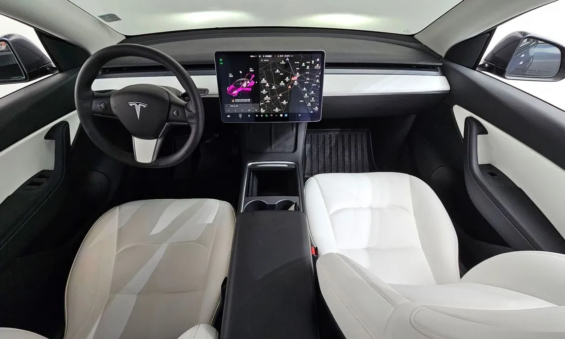Tesla Model Y — фото 7