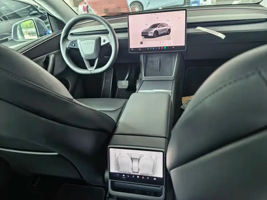 Tesla Model Y — фото 6