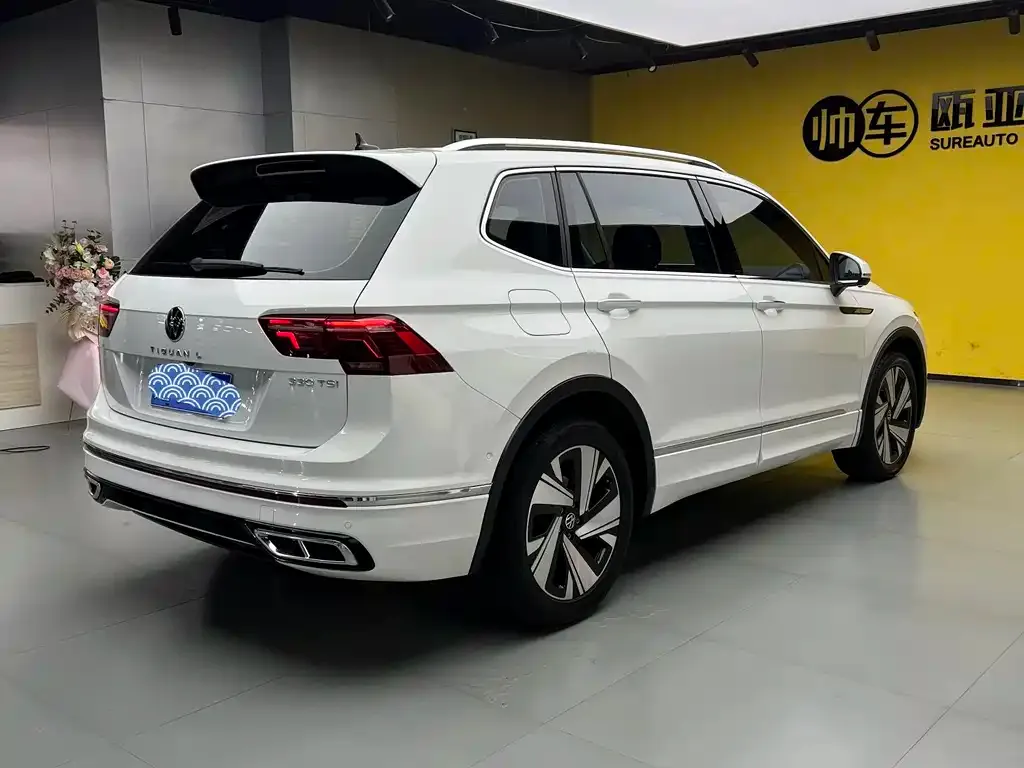 Volkswagen Tiguan L — фото 4