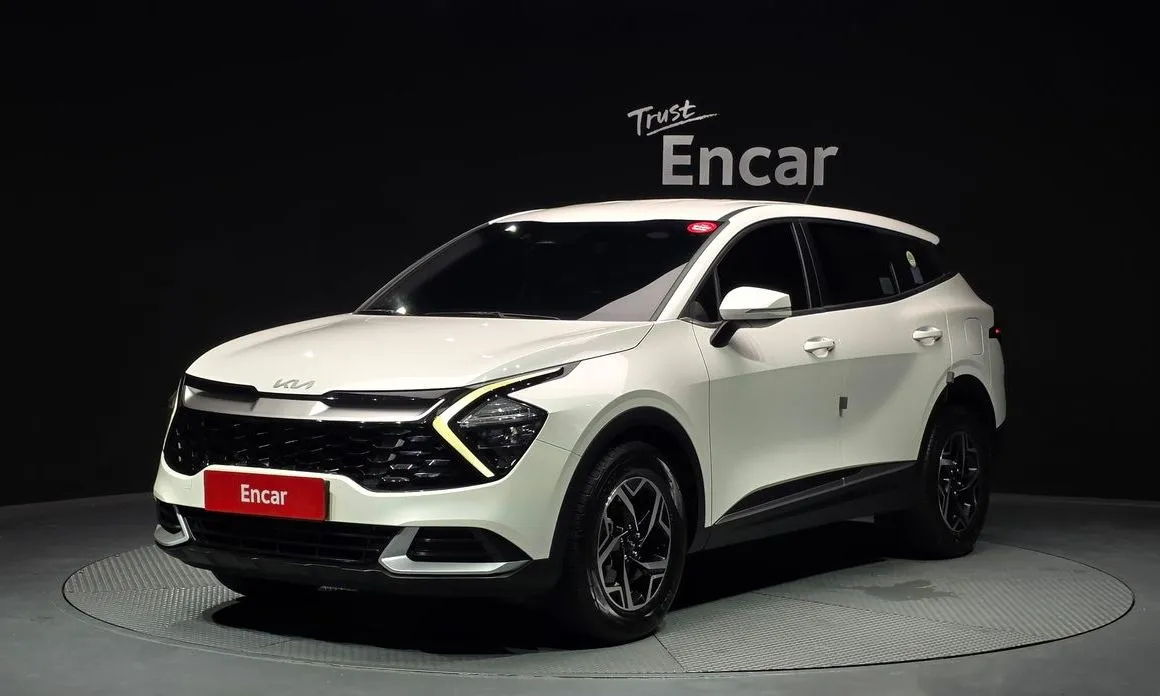 Kia Sportage — фото 1