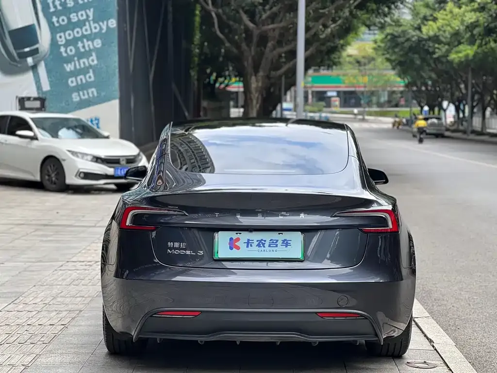 Tesla Model 3 — фото 10