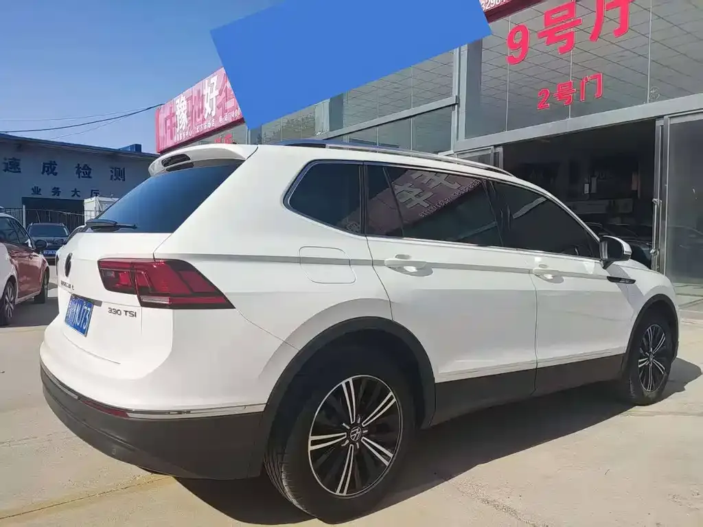 Volkswagen Tiguan L — фото 2