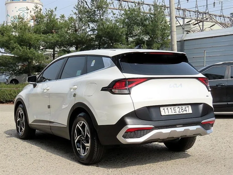 Kia Sportage — фото 9