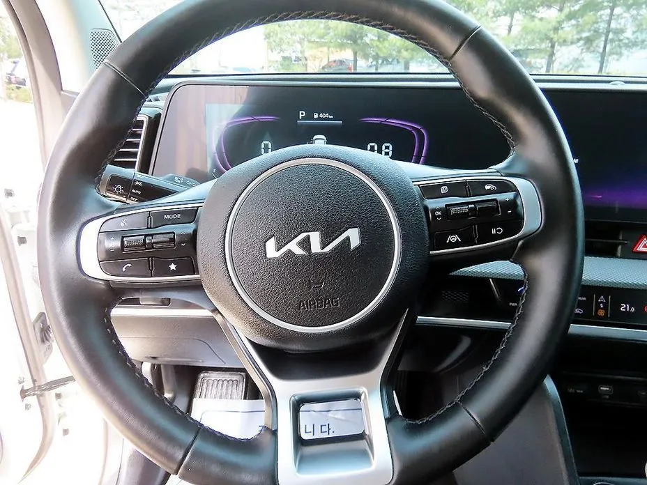 Kia Sportage — фото 10