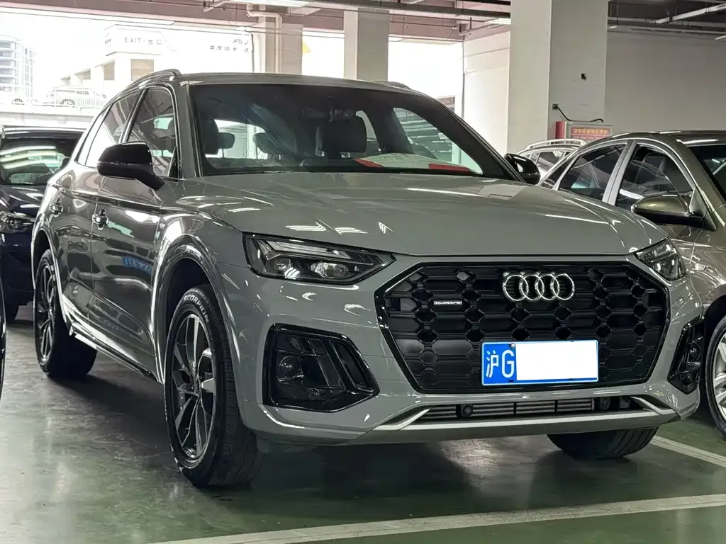 Audi Q5L — фото 10