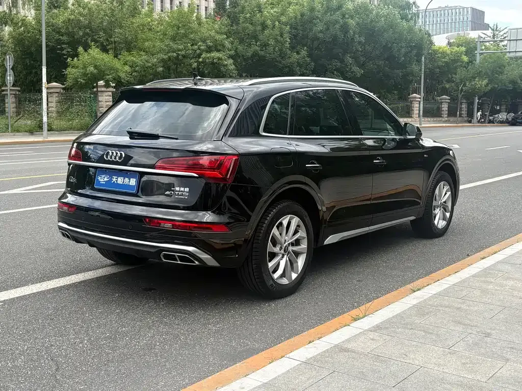 Audi Q5L — фото 9
