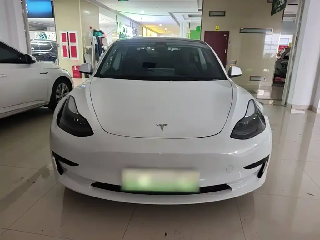 Tesla Model 3 — фото 7