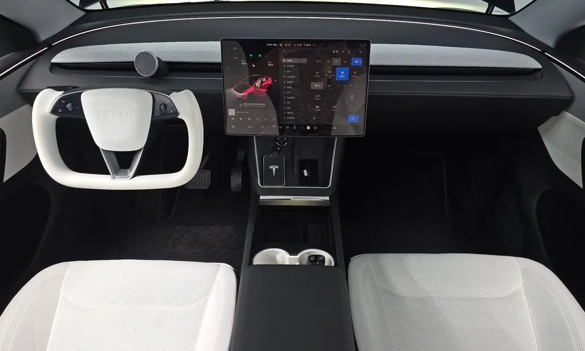Tesla Model Y — фото 6