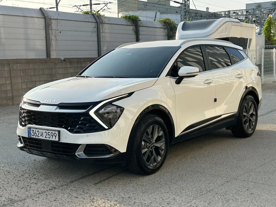 Kia Sportage — фото 10