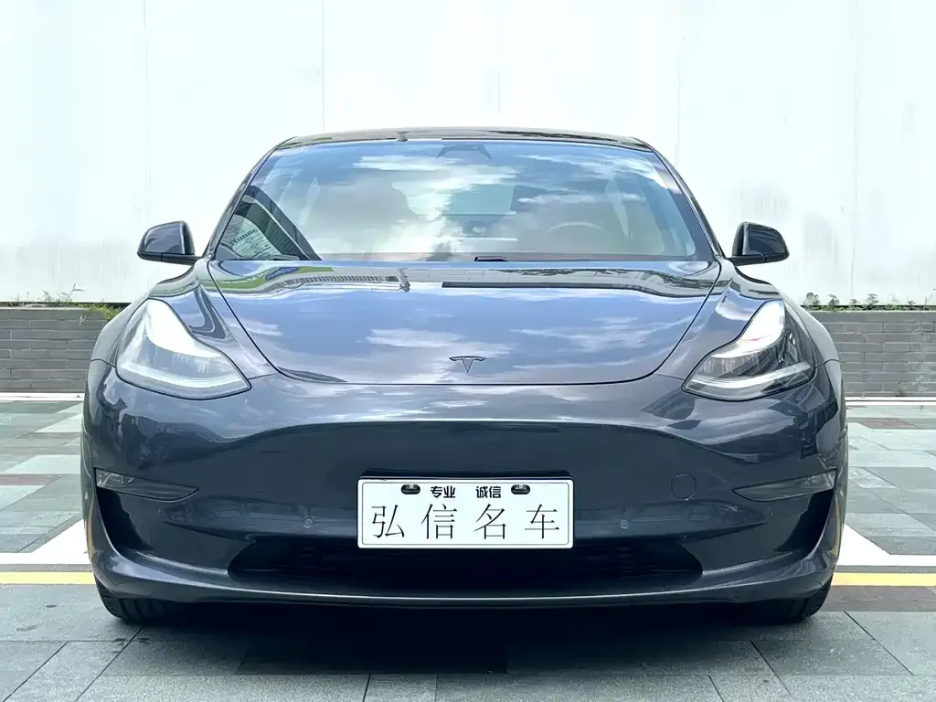 Tesla Model 3 — фото 10