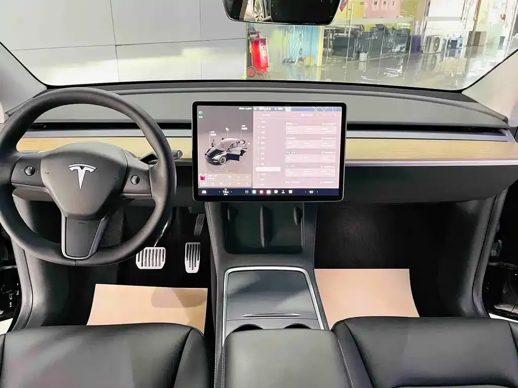 Tesla Model Y — фото 7