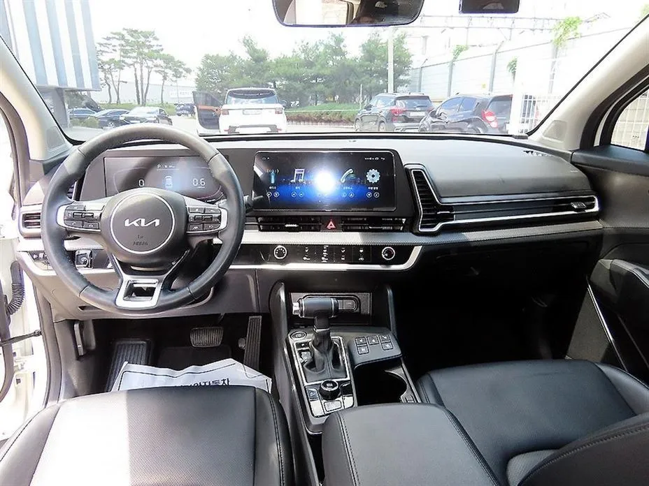Kia Sportage — фото 9