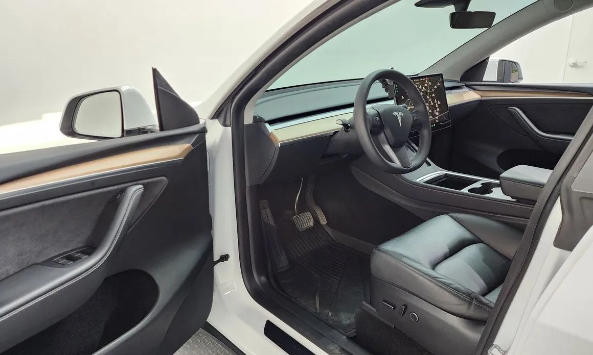 Tesla Model Y — фото 6