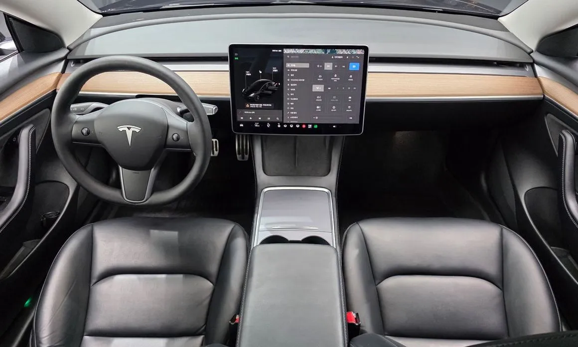 Tesla Model 3 — фото 9
