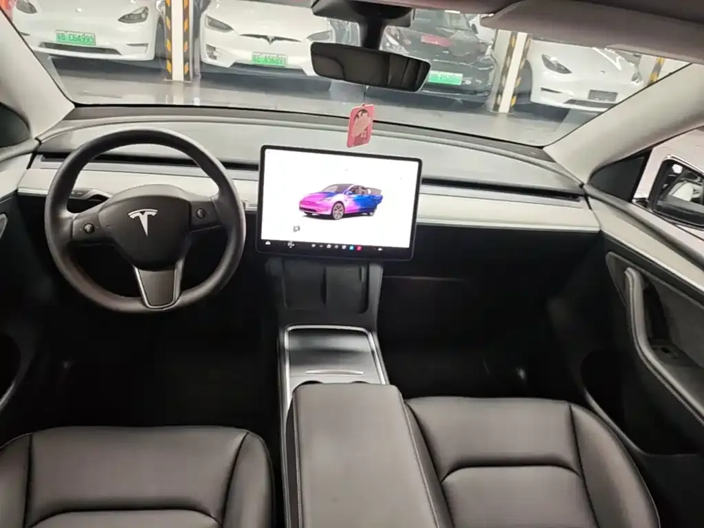 Tesla Model Y — фото 6
