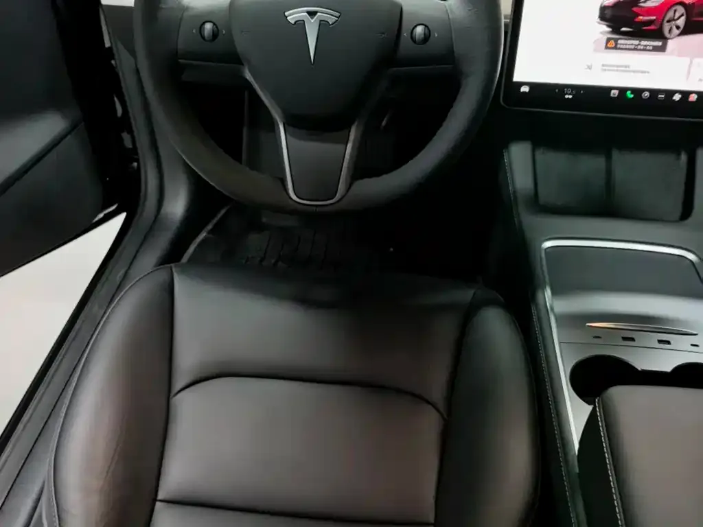 Tesla Model 3 — фото 7