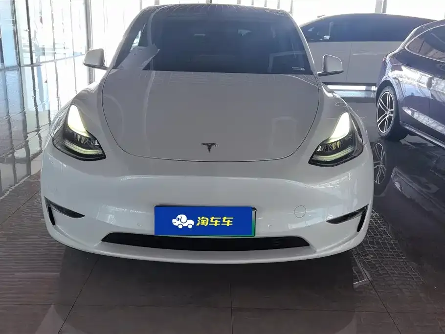 Tesla Model Y — фото 7