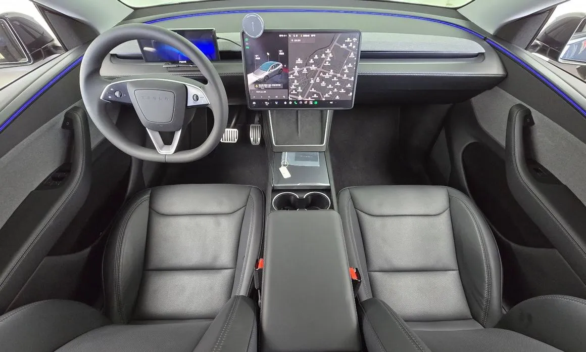 Tesla Model Y — фото 10