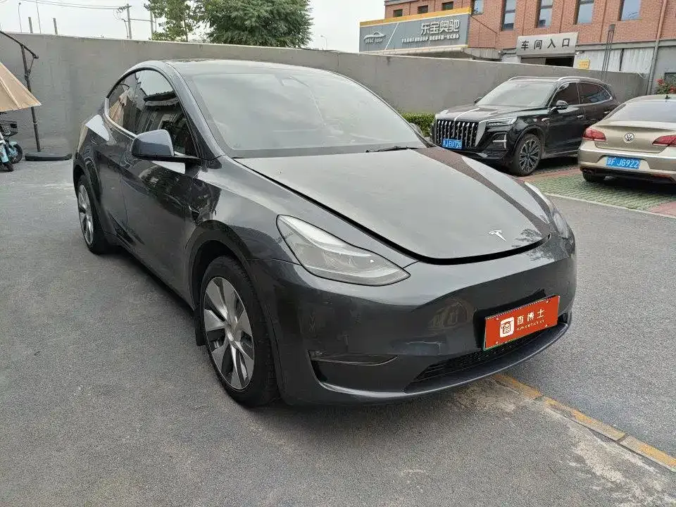 Tesla Model Y — фото 10