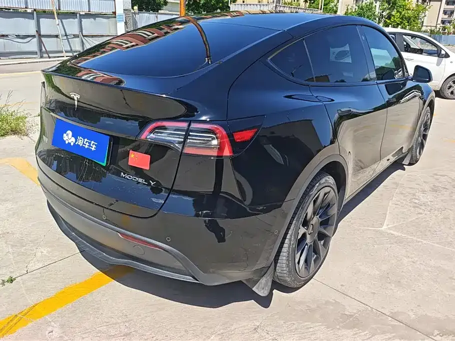 Tesla Model Y — фото 6