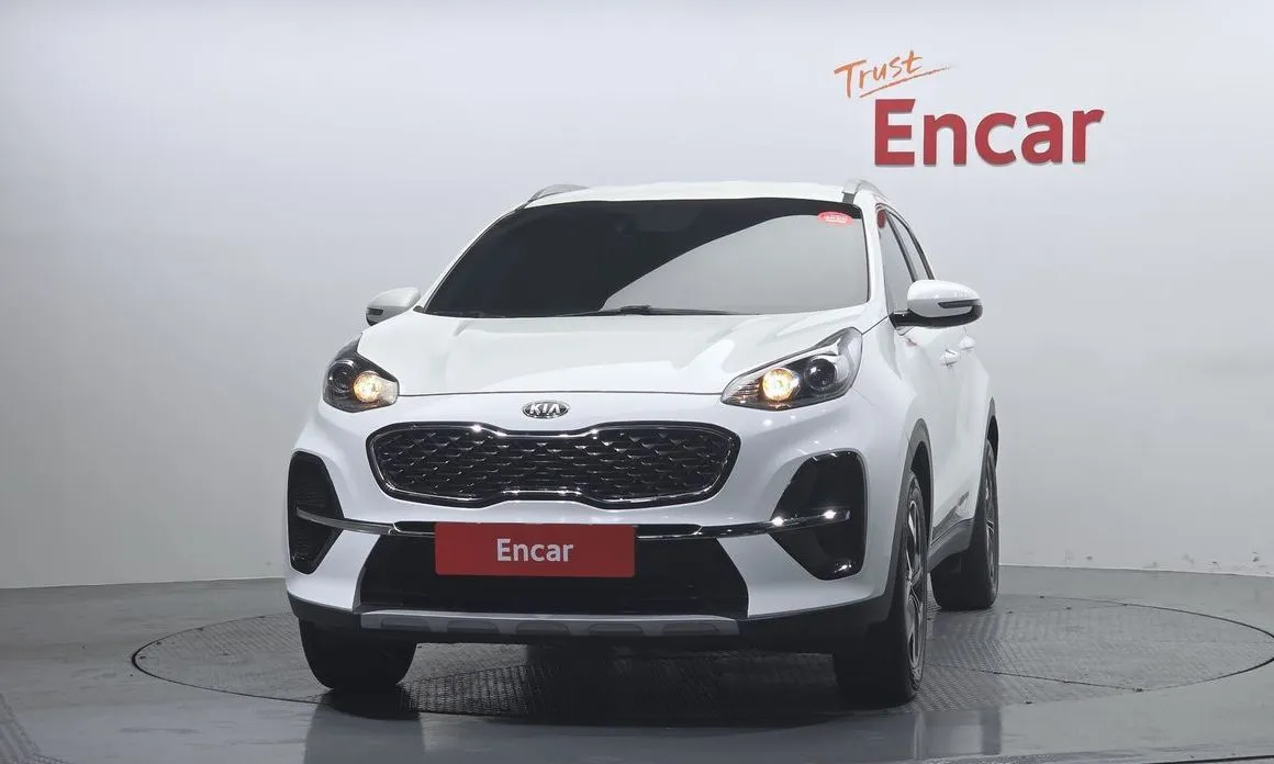 Kia Sportage — фото 7