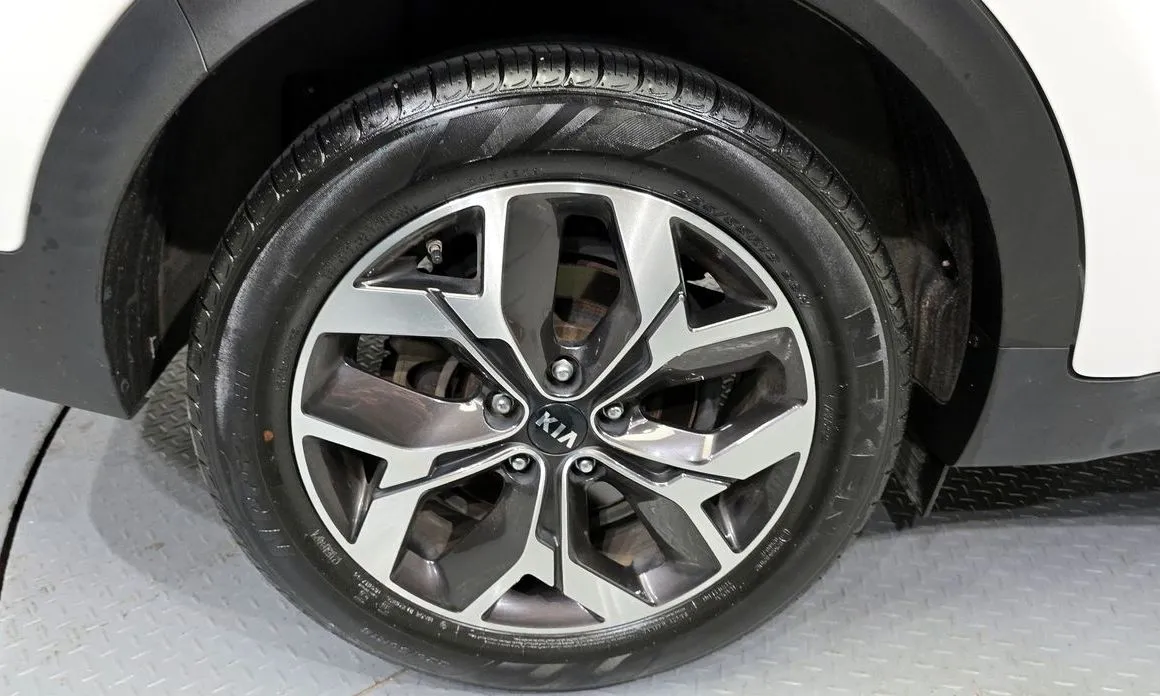 Kia Sportage — фото 9