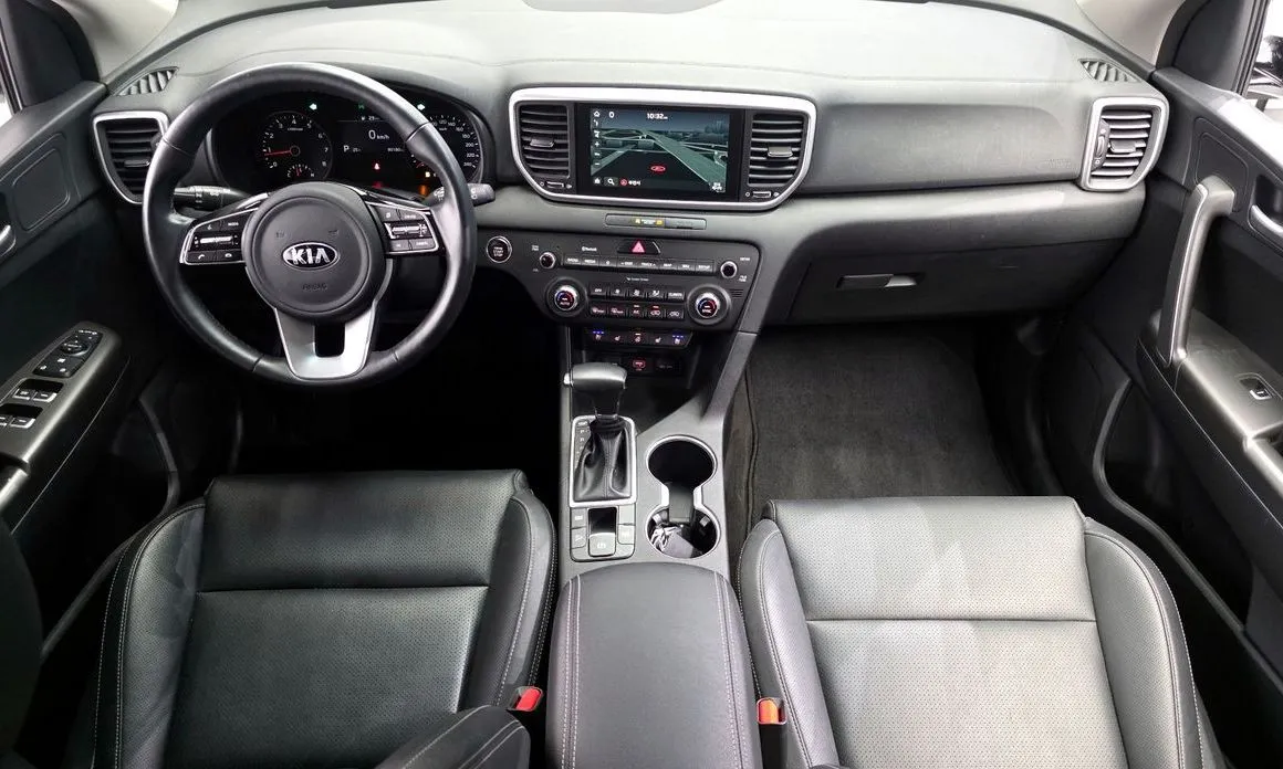 Kia Sportage — фото 10