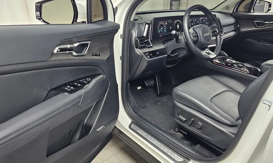 Kia Sportage — фото 10