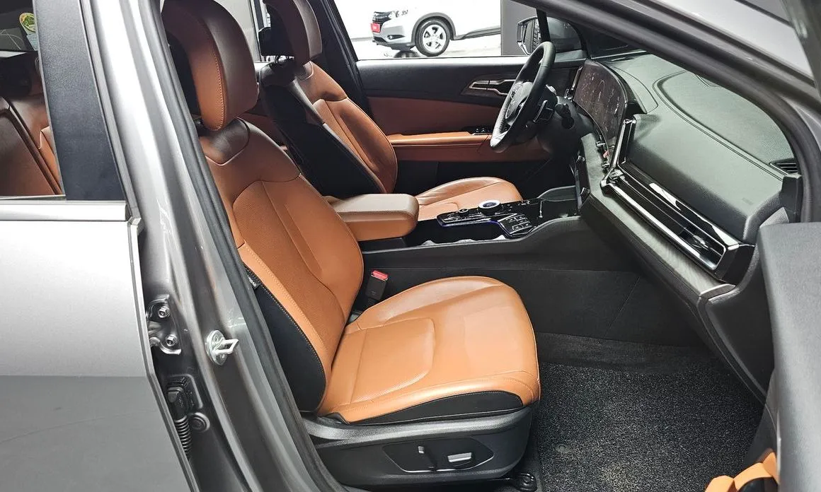 Kia Sportage — фото 9