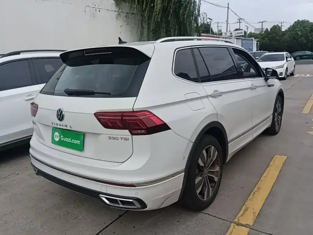 Volkswagen Tiguan L — фото 10