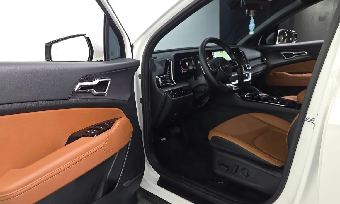 Kia Sportage — фото 10