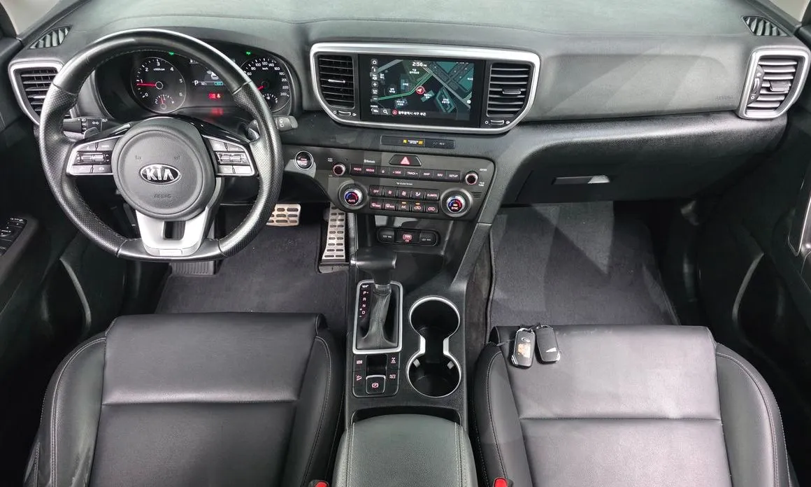 Kia Sportage — фото 9